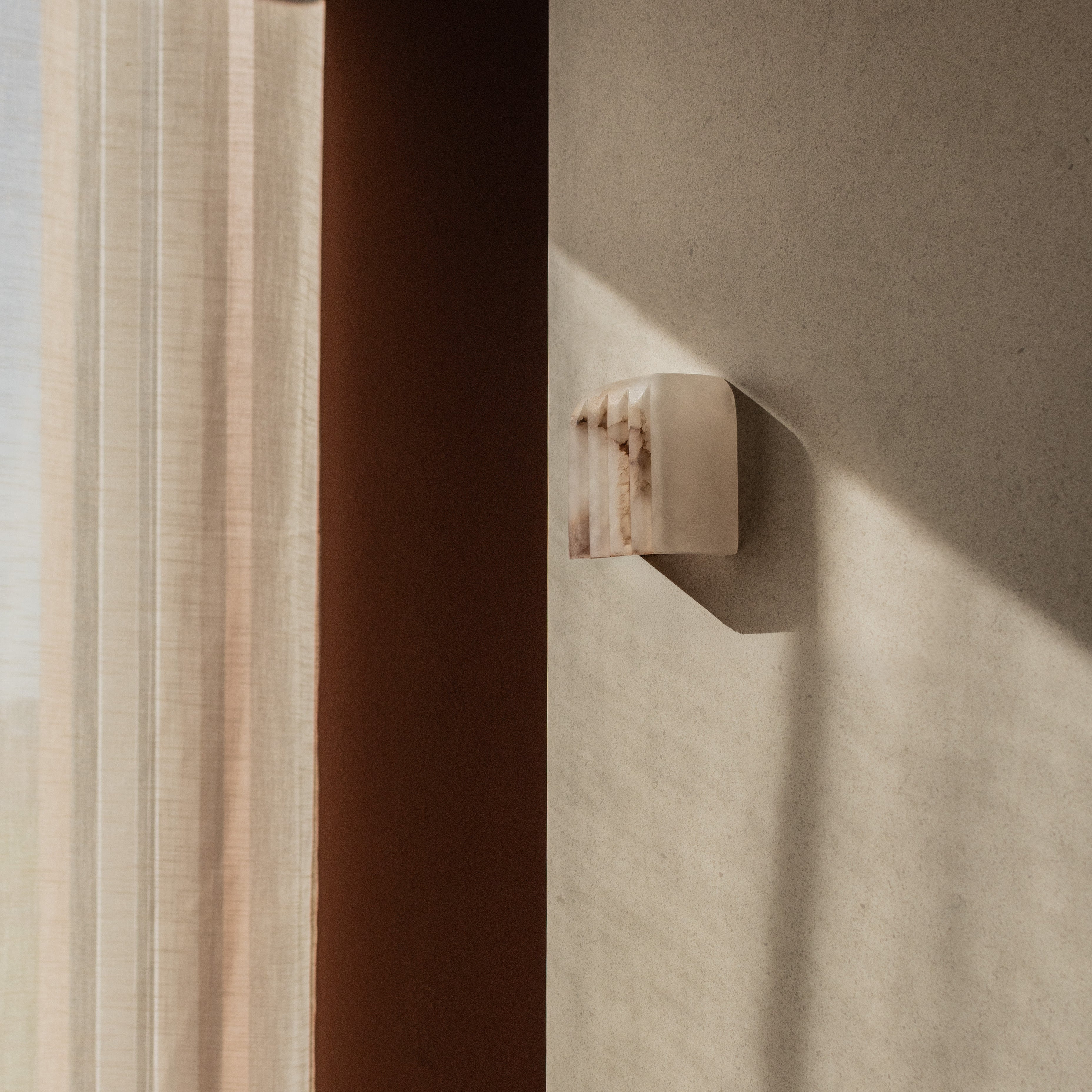 MEROPE Alabaster Wall Sconce with Patterned Finish — Embassy Interiors